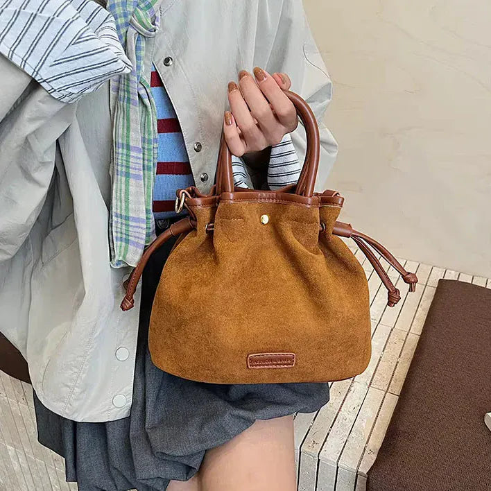 Sac seau bourse en suédine