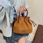 Sac seau bourse en suédine