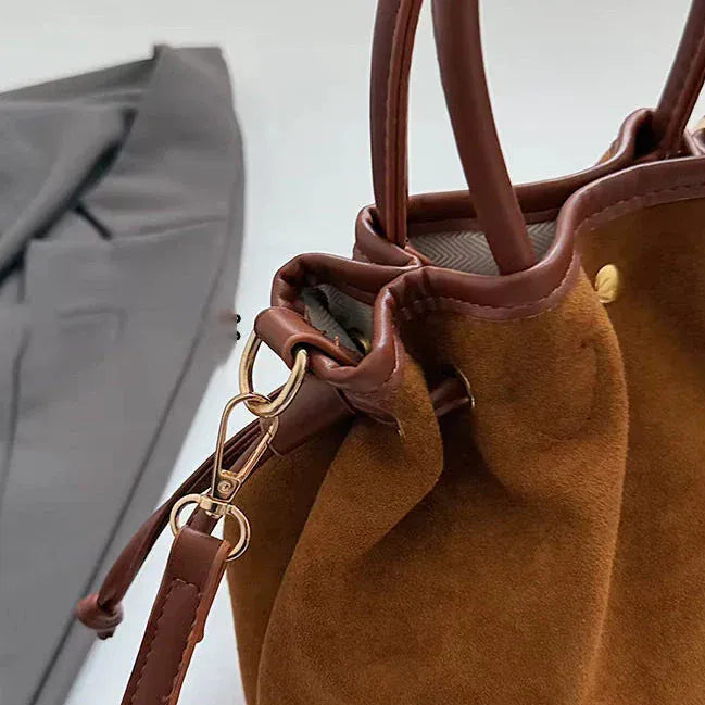 Sac seau bourse en suédine