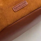 Sac seau bourse en suédine