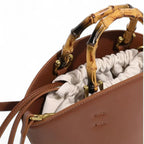 Sac seau en cuir surpiqué bambou