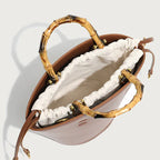 Sac seau en cuir surpiqué bambou